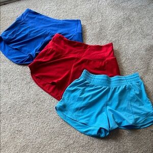 Lululemon 3 pair Bundle - Women’s Size 6 Running Shorts - Blue, Red, Light Blue